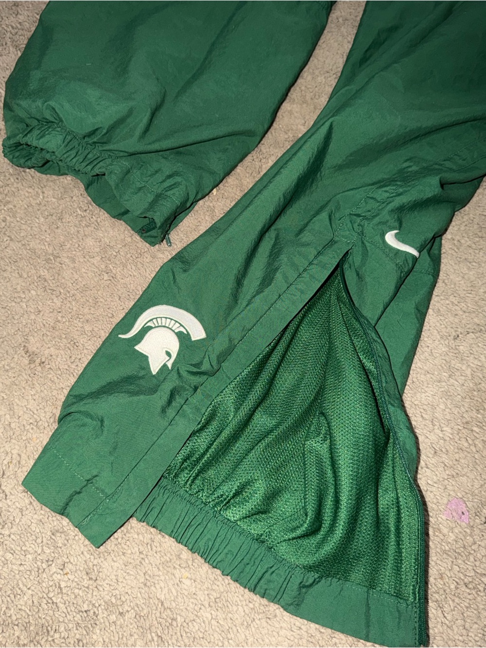 Y2K vintage Nike Green Men's Track Pants ( Michigan State ) with Spartan Logo